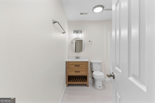 223 Pinehaven Dr, Lagrange, GA 30240 - half bath with vanity and a textured ceiling