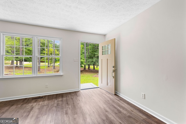 223 Pinehaven Dr, Lagrange, GA 30240 - foyer with wood finished floors and a textured ceiling