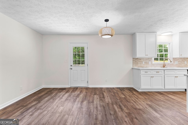 223 Pinehaven Dr, Lagrange, GA 30240 - unfurnished dining area with wood finished floors and a textured ceiling