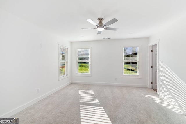 4179 Hanes Dr, Decatur, GA 30035 - spare room with healthy amount of natural light, light colored carpet, and ceiling fan