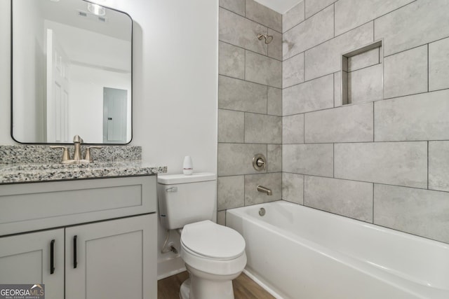 4179 Hanes Dr, Decatur, GA 30035 - bathroom with vanity, wood finished floors, and shower / washtub combination