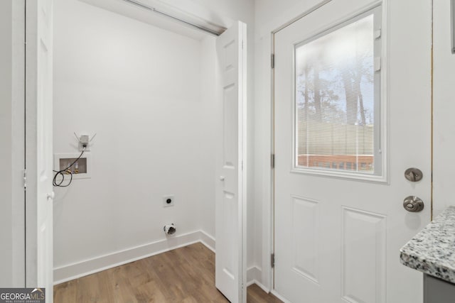 4179 Hanes Dr, Decatur, GA 30035 - laundry room featuring hookup for an electric dryer, light wood-style flooring, and hookup for a washing machine