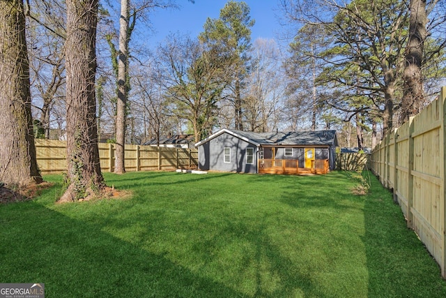 4179 Hanes Dr, Decatur, GA 30035 - fenced backyard featuring a wooden deck