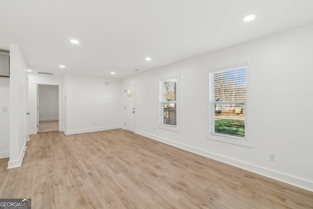 4179 Hanes Dr, Decatur, GA 30035 - unfurnished living room featuring light wood-type flooring and recessed lighting