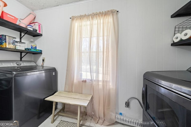 1755 Fairburn Rd SW, Atlanta, GA 30331 - washroom with washer and dryer and a textured ceiling