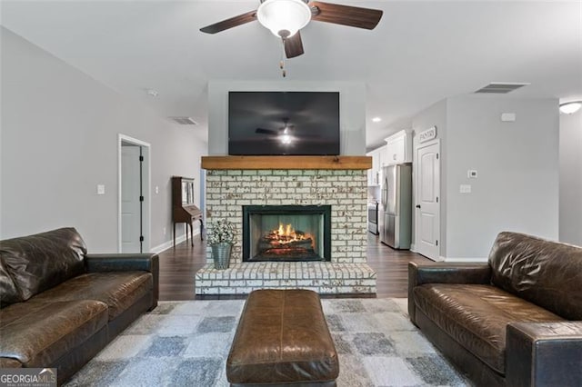 2716 Taylorsville Rd, Taylorsville, GA 30178 - living area with a ceiling fan, dark wood-type flooring, a fireplace, and recessed lighting
