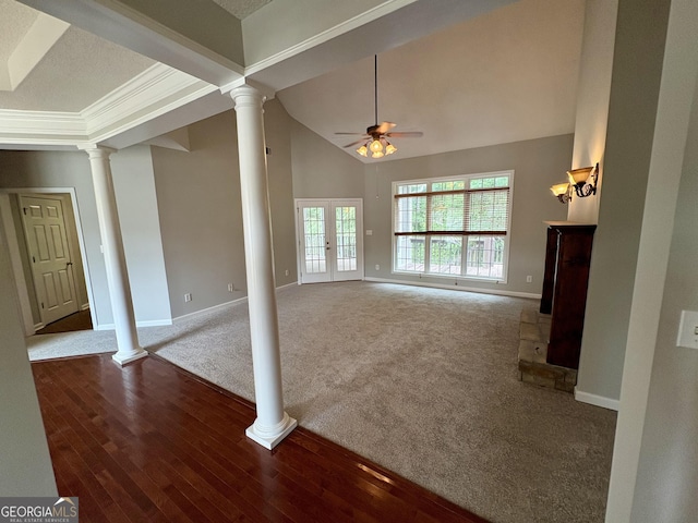 237 Shockley Way, Dallas, GA 30157 - unfurnished living room with ornate columns, ceiling fan, carpet floors, wood finished floors, and vaulted ceiling