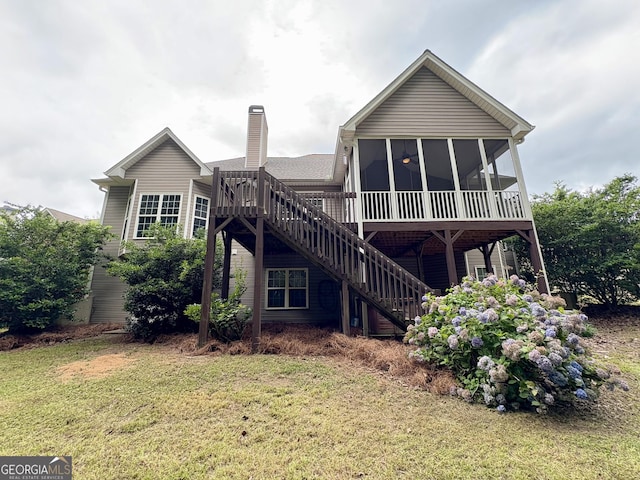 237 Shockley Way, Dallas, GA 30157 - rear view of property featuring a chimney, stairway, a lawn, a sunroom, and a wooden deck