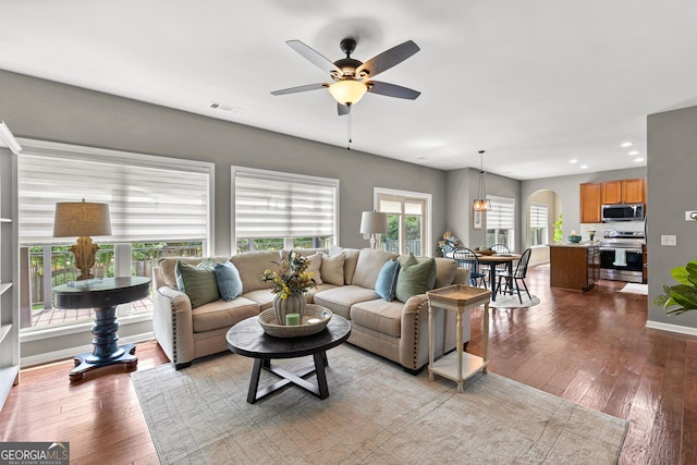 51 Stonebridge Way, Newnan, GA 30265 - living room featuring arched walkways, ceiling fan, wood finished floors, and recessed lighting