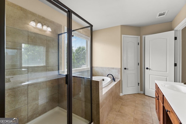 51 Stonebridge Way, Newnan, GA 30265 - full bathroom with a garden tub, vanity, a stall shower, and tile patterned floors