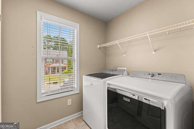 51 Stonebridge Way, Newnan, GA 30265 - laundry area with independent washer and dryer and baseboards