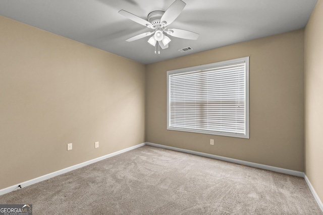 51 Stonebridge Way, Newnan, GA 30265 - carpeted spare room with baseboards and ceiling fan