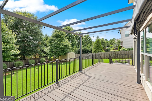 51 Stonebridge Way, Newnan, GA 30265 - wooden deck with a storage shed, a fenced backyard, and a pergola
