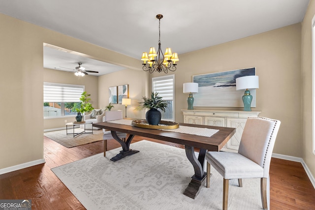 51 Stonebridge Way, Newnan, GA 30265 - dining area featuring a chandelier, wood finished floors, and a ceiling fan