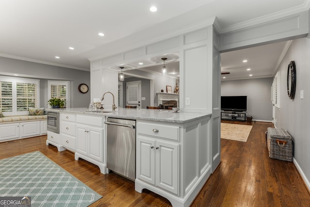 2240 Six Branches Dr, Roswell, GA 30076 - kitchen featuring stainless steel appliances, white cabinetry, crown molding, open floor plan, and dark wood-style flooring