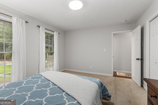 2240 Six Branches Dr, Roswell, GA 30076 - carpeted bedroom with baseboards