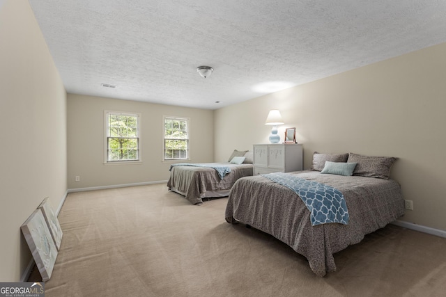 2240 Six Branches Dr, Roswell, GA 30076 - bedroom with light carpet and a textured ceiling