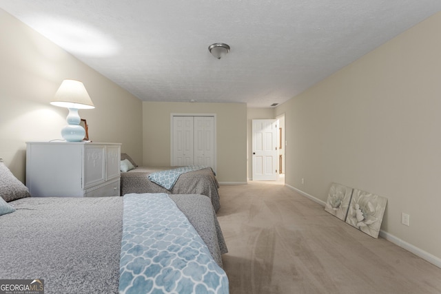 2240 Six Branches Dr, Roswell, GA 30076 - bedroom with light colored carpet and a closet