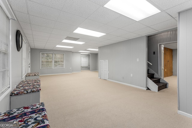 2240 Six Branches Dr, Roswell, GA 30076 - below grade area featuring carpet, stairs, and a paneled ceiling