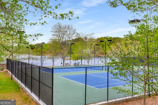 2240 Six Branches Dr, Roswell, GA 30076 - view of tennis court with a water view