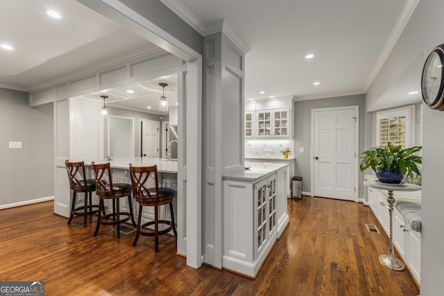 2240 Six Branches Dr, Roswell, GA 30076 - hall featuring dark wood finished floors, crown molding, and recessed lighting