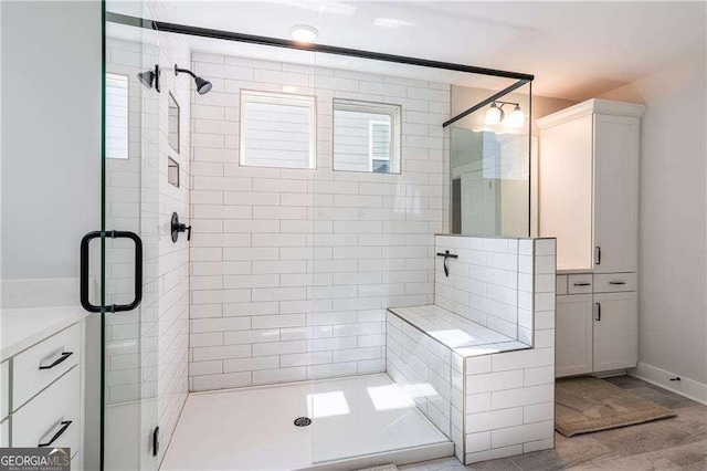 338 Boundless Ln, Canton, GA 30114 - bathroom featuring a stall shower and vanity