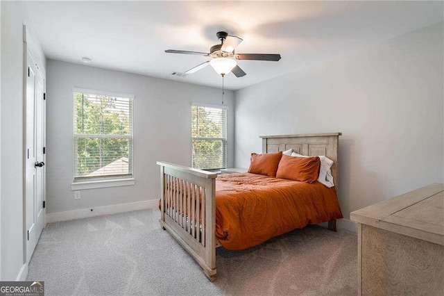 338 Boundless Ln, Canton, GA 30114 - bedroom with light colored carpet and a ceiling fan