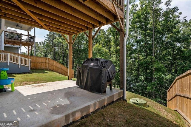 338 Boundless Ln, Canton, GA 30114 - fenced backyard featuring a patio and a grill