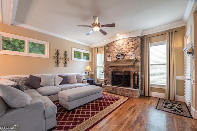 2403 Wistful Way, Marietta, GA 30066 - living room featuring crown molding, ceiling fan, wood finished floors, and a fireplace