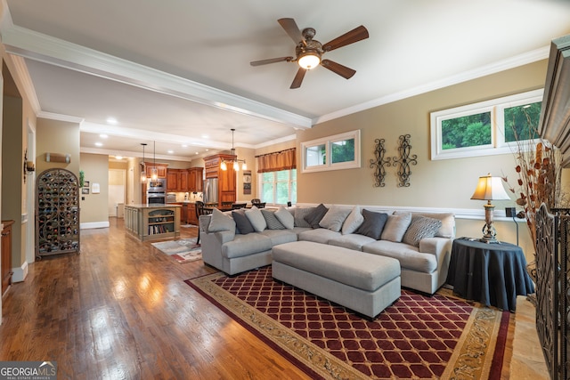2403 Wistful Way, Marietta, GA 30066 - living area with healthy amount of natural light, wood finished floors, ceiling fan, crown molding, and recessed lighting