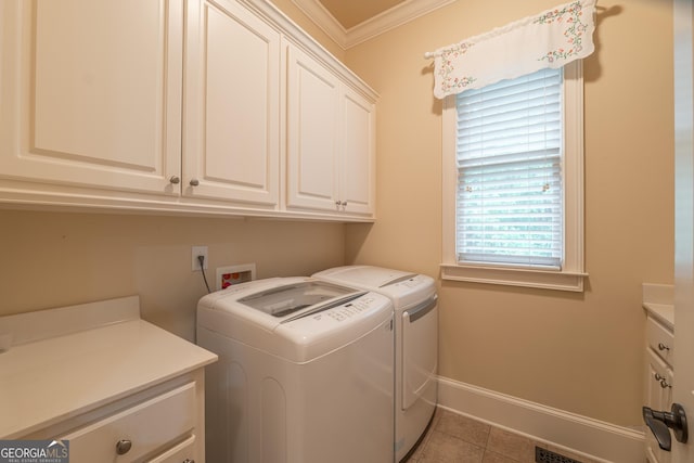 2403 Wistful Way, Marietta, GA 30066 - washroom featuring cabinet space, washer and dryer, crown molding, and tile patterned floors