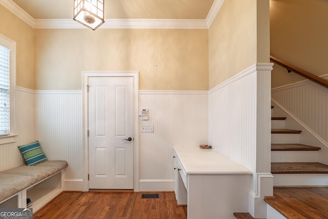 2403 Wistful Way, Marietta, GA 30066 - mudroom featuring wainscoting, wood finished floors, and crown molding