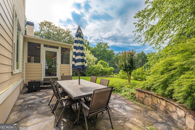 2403 Wistful Way, Marietta, GA 30066 - view of patio / terrace featuring outdoor dining space and a sunroom