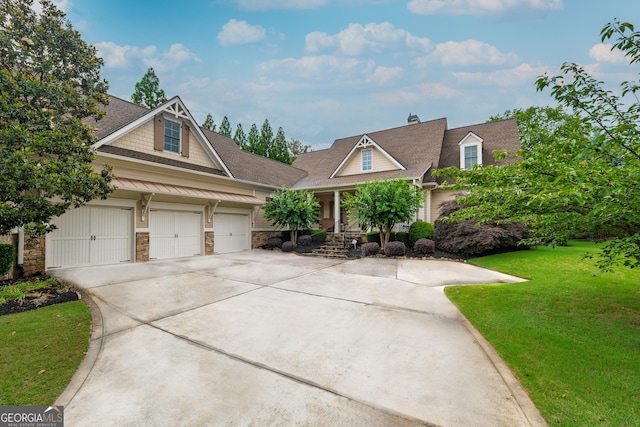 2403 Wistful Way, Marietta, GA 30066 - view of front of home with driveway, a front lawn, stone siding, covered porch, and a shingled roof