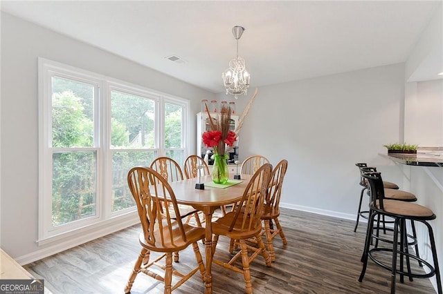 4180 Pineset Dr, Alpharetta, GA 30022 - dining area with dark wood-type flooring and a chandelier