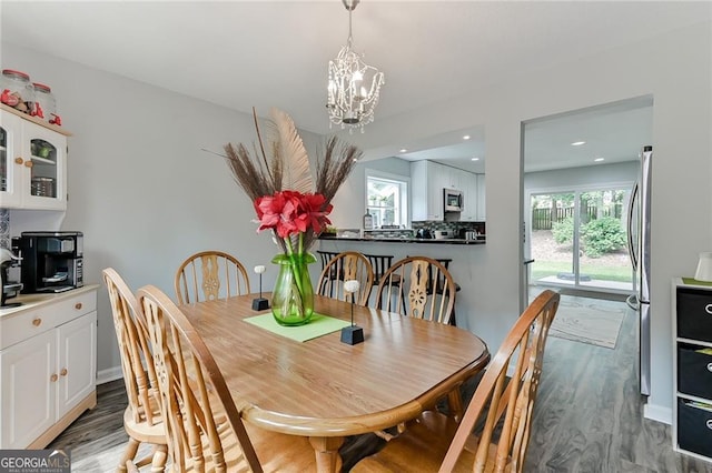 4180 Pineset Dr, Alpharetta, GA 30022 - dining space with a chandelier, wood finished floors, and recessed lighting