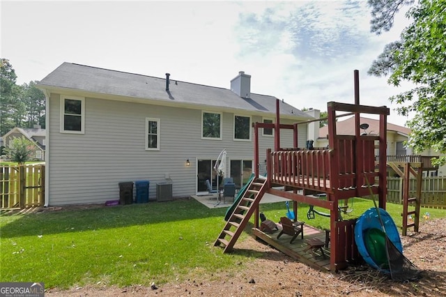 4180 Pineset Dr, Alpharetta, GA 30022 - rear view of property with a playground, a fenced backyard, a chimney, and a patio