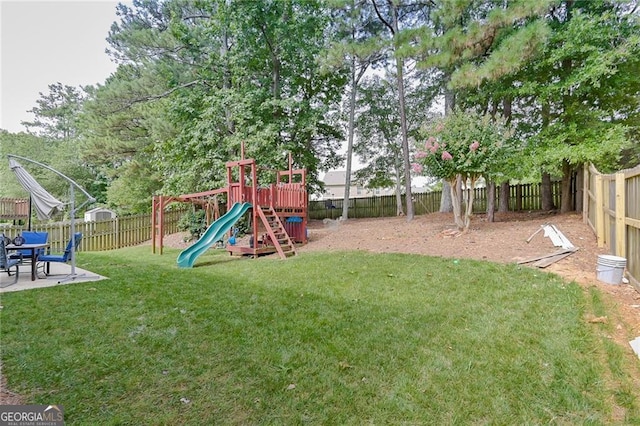 4180 Pineset Dr, Alpharetta, GA 30022 - fenced backyard featuring a playground and a patio area