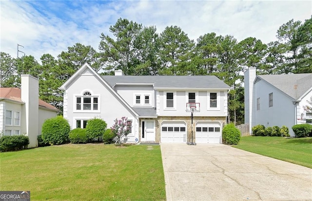4180 Pineset Dr, Alpharetta, GA 30022 - view of front of house with concrete driveway, a garage, a front lawn, and a chimney