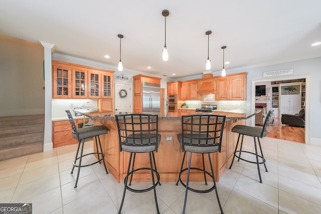 750 Old Loganville Rd SW, Loganville, GA 30052 - kitchen with appliances with stainless steel finishes, backsplash, ornamental molding, recessed lighting, and light tile patterned floors