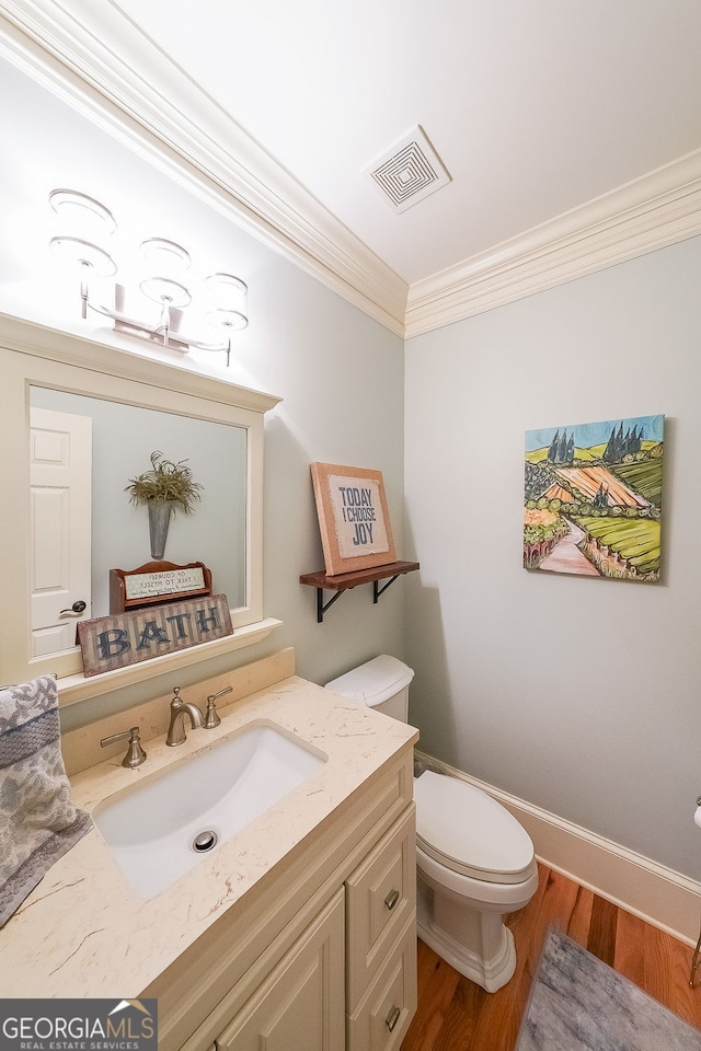 750 Old Loganville Rd SW, Loganville, GA 30052 - half bath with ornamental molding, vanity, and wood finished floors