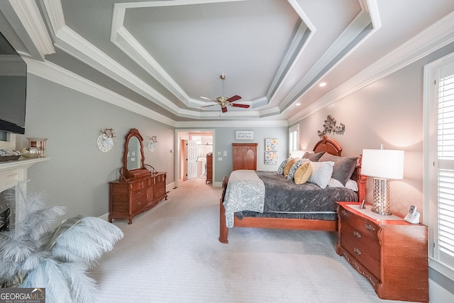 750 Old Loganville Rd SW, Loganville, GA 30052 - bedroom with light carpet, ornamental molding, a raised ceiling, multiple windows, and a fireplace