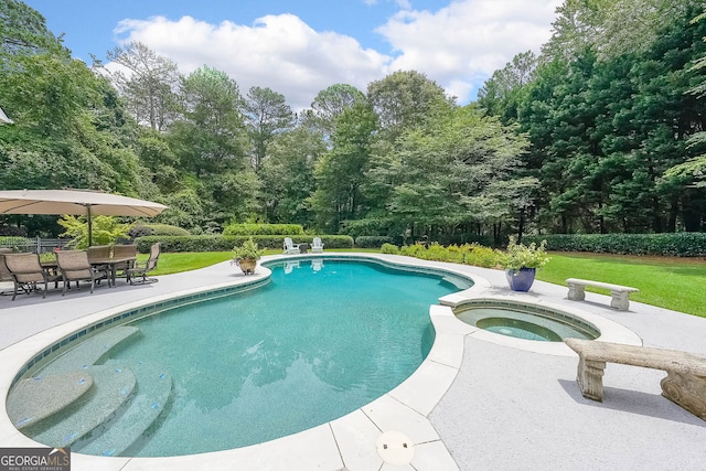 750 Old Loganville Rd SW, Loganville, GA 30052 - swimming pool featuring a patio area, a yard, an in-ground hot tub, and view of wooded area
