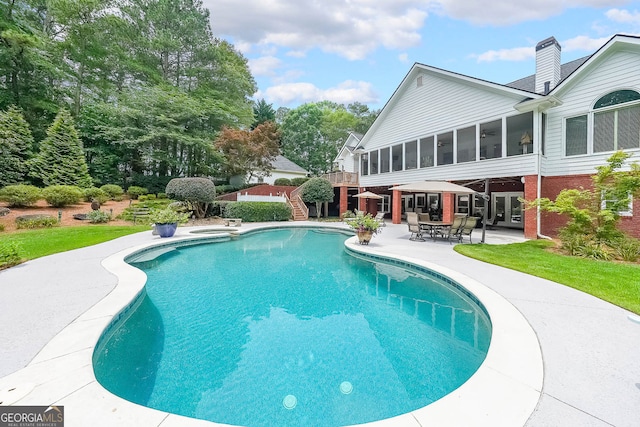 750 Old Loganville Rd SW, Loganville, GA 30052 - outdoor pool with a sunroom, a patio area, french doors, and stairway