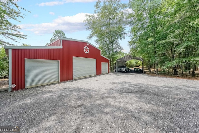 750 Old Loganville Rd SW, Loganville, GA 30052 - garage featuring a detached garage and driveway