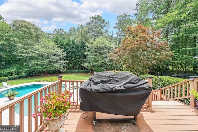 750 Old Loganville Rd SW, Loganville, GA 30052 - wooden deck featuring an outdoor pool and area for grilling