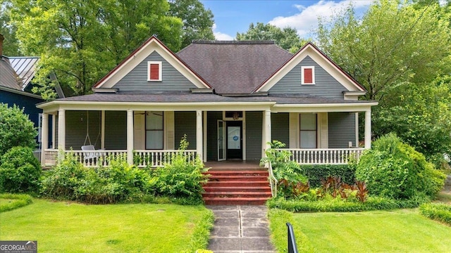 226 Noyes St, Cedartown, GA 30125 - view of front of property featuring covered porch, a front lawn, and a shingled roof