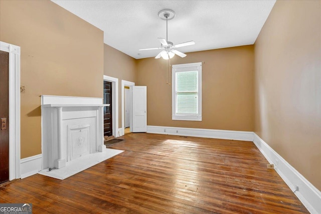 226 Noyes St, Cedartown, GA 30125 - unfurnished living room with a ceiling fan and hardwood / wood-style flooring