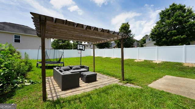 400 Silver Spring St, Dallas, GA 30157 - fenced backyard with a trampoline, a pergola, outdoor lounge area, and a patio