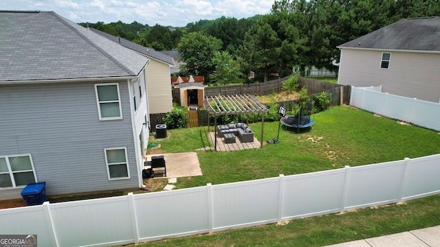 400 Silver Spring St, Dallas, GA 30157 - fenced backyard featuring an outdoor living space, a patio, and a trampoline